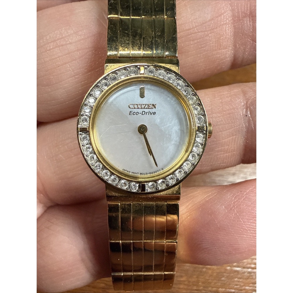 Citizen Eco-Drive Women's Gold Tone Crystal Bezel Mother of Pearl Watch B023